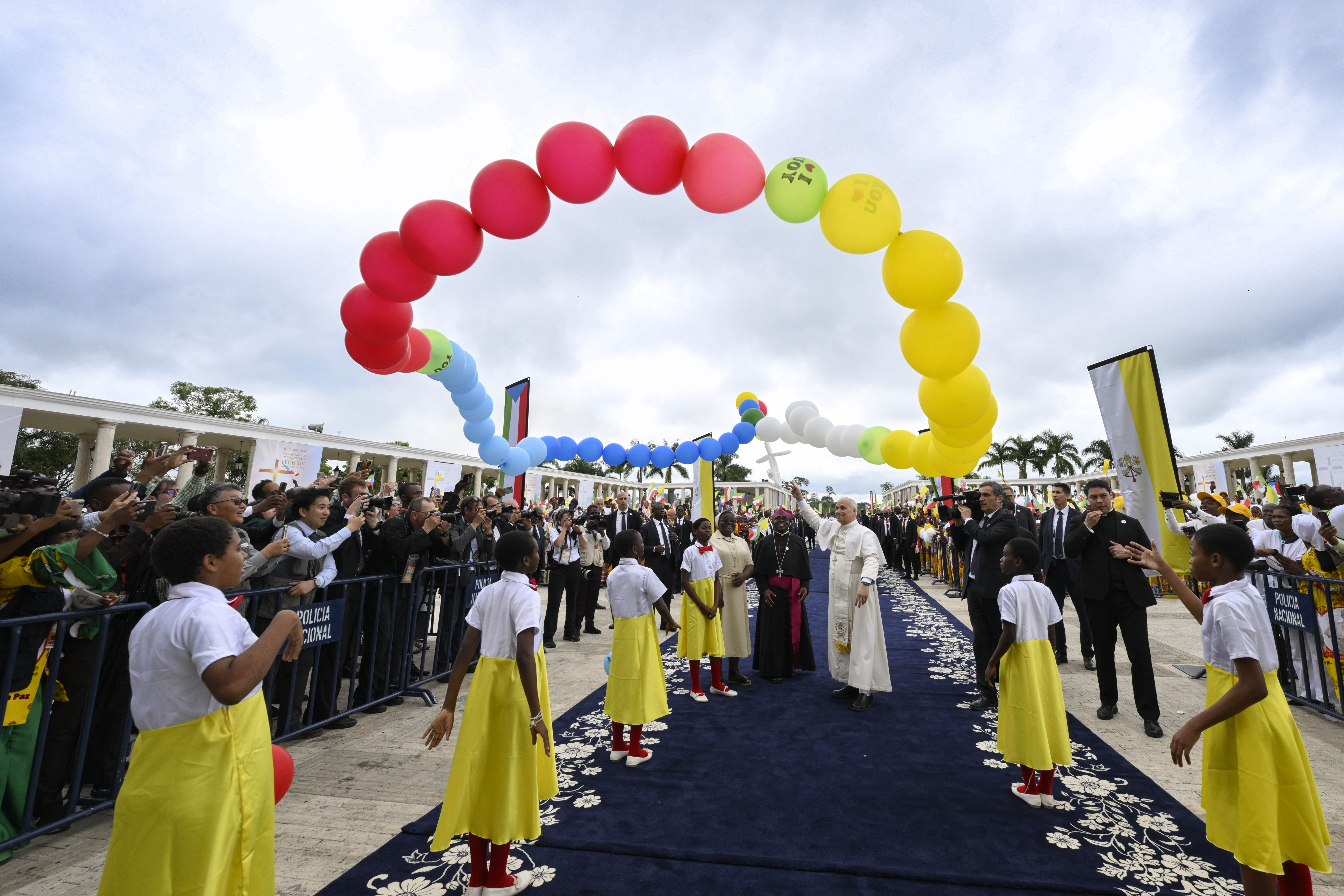 Pope Leo XIV stands beneath a balloon formation of a rosary at the Basilica of the Immaculate Conception in Mengomeyén, Equatorial Guinea, Wednesday, April 22, 2026. | Credit: Vatican Media