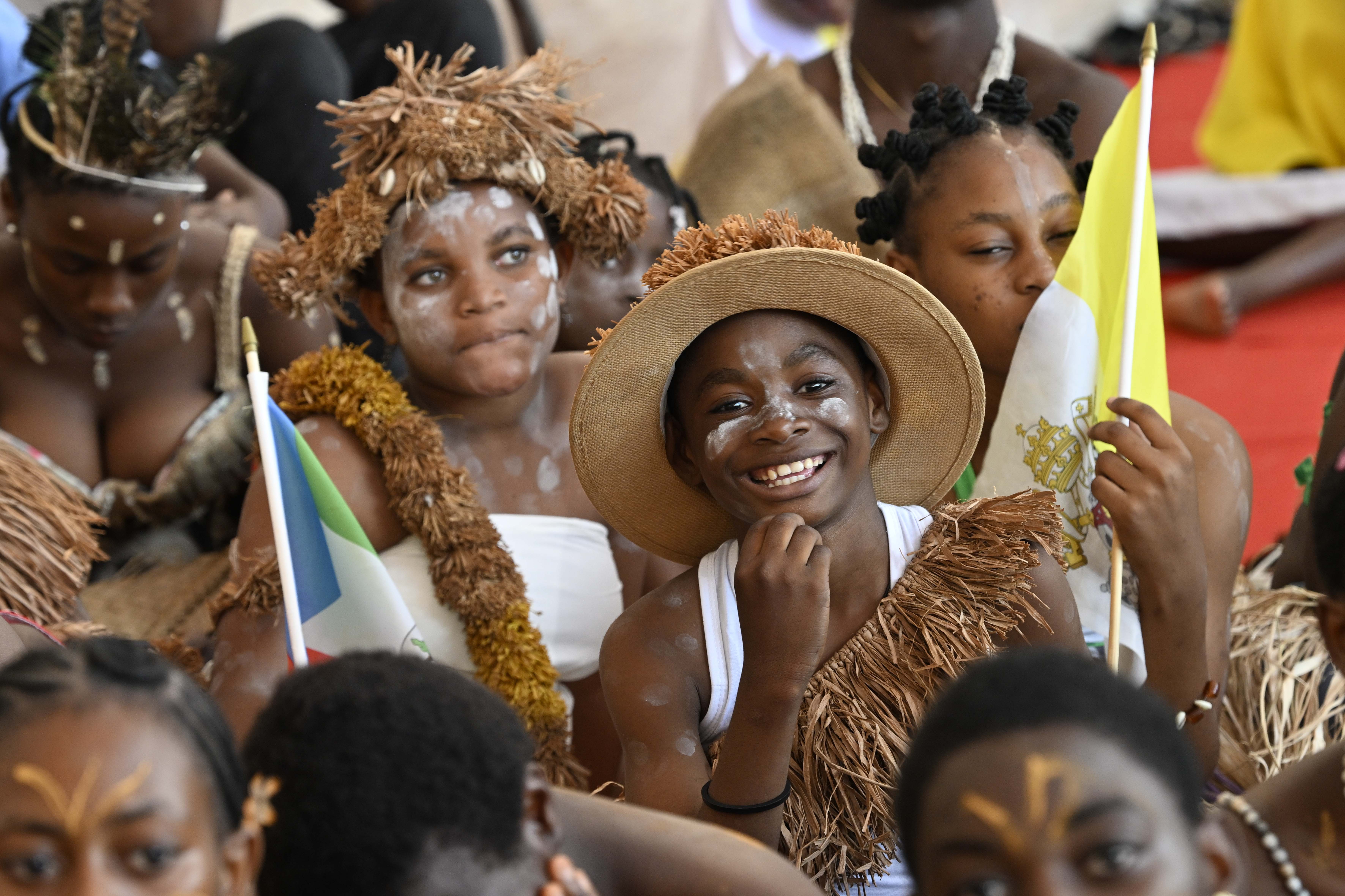 Catholics smile during Mass with Pope Leo XIV at Malabo Stadium in Equatorial Guinea, Thursday, April 23, 2026. | Credit: Vatican Media