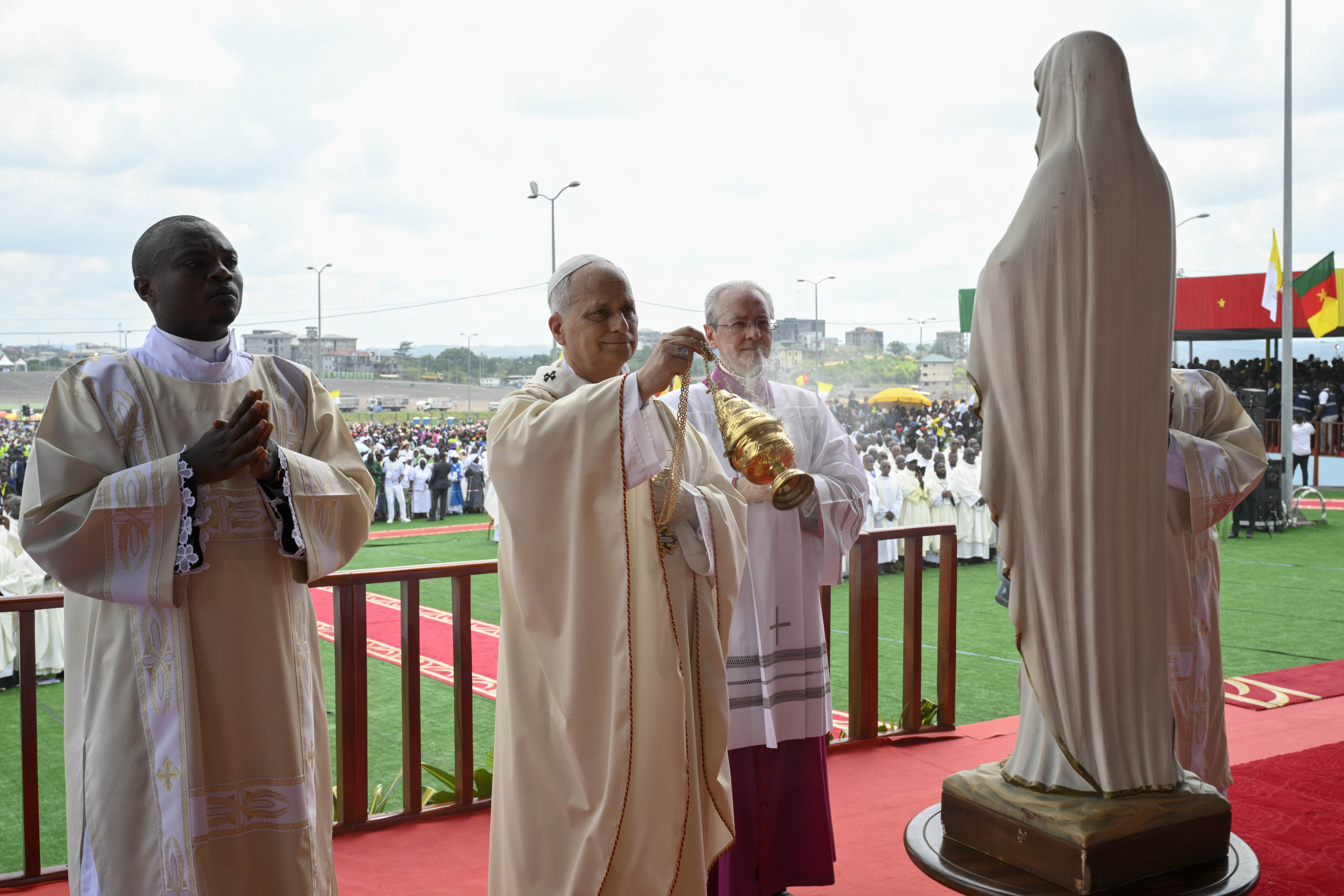 Pope Leo XIV incenses a statue of the Blessed Mother at Japoma Stadium during Mass on Friday, April 17, 2026. | Credit: Vatican Media