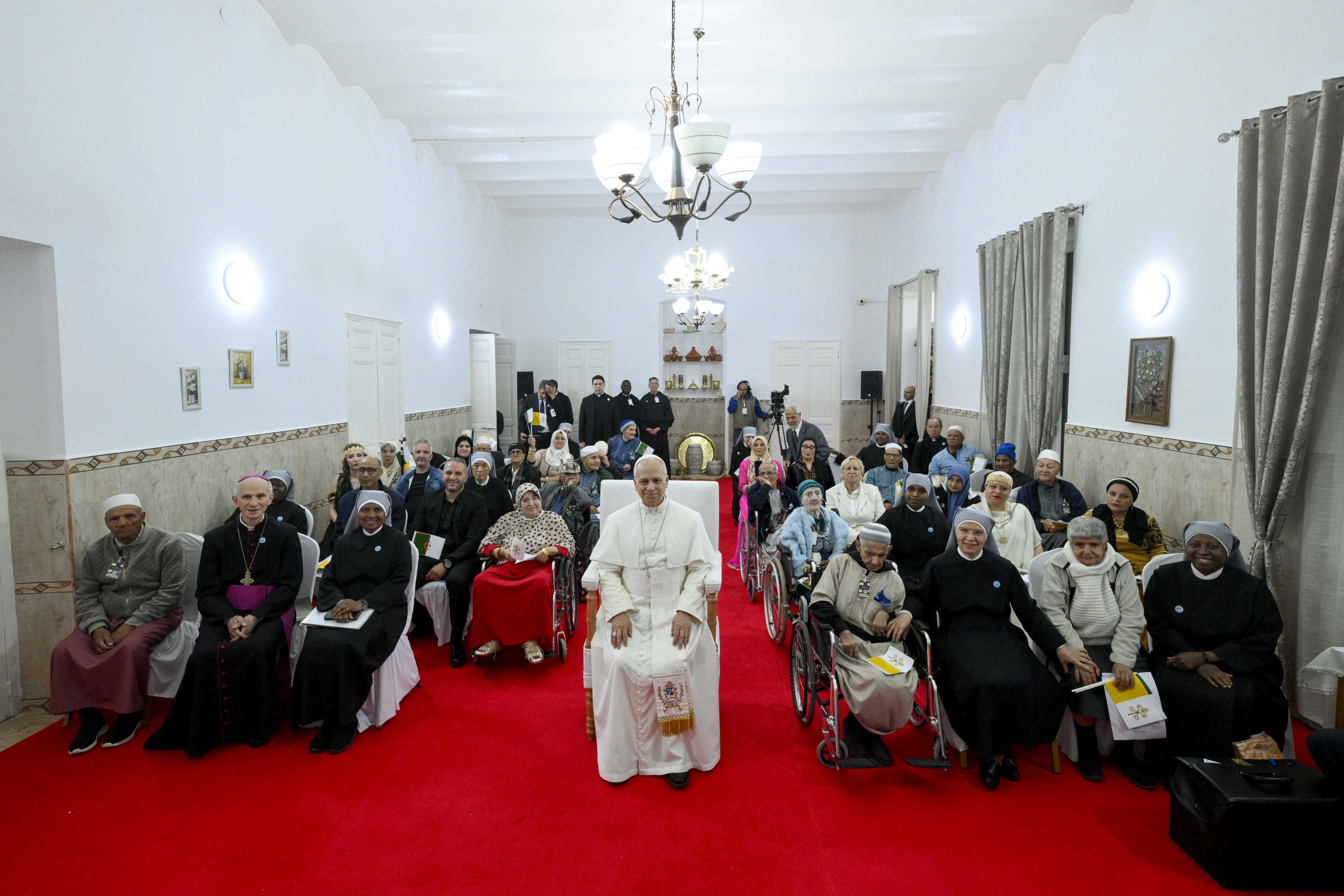 Pope Leo XIV visits with residents of a care home for the elderly in Annaba, Algeria, Tuesday, April 14, 2026. | Credit: Vatican Media