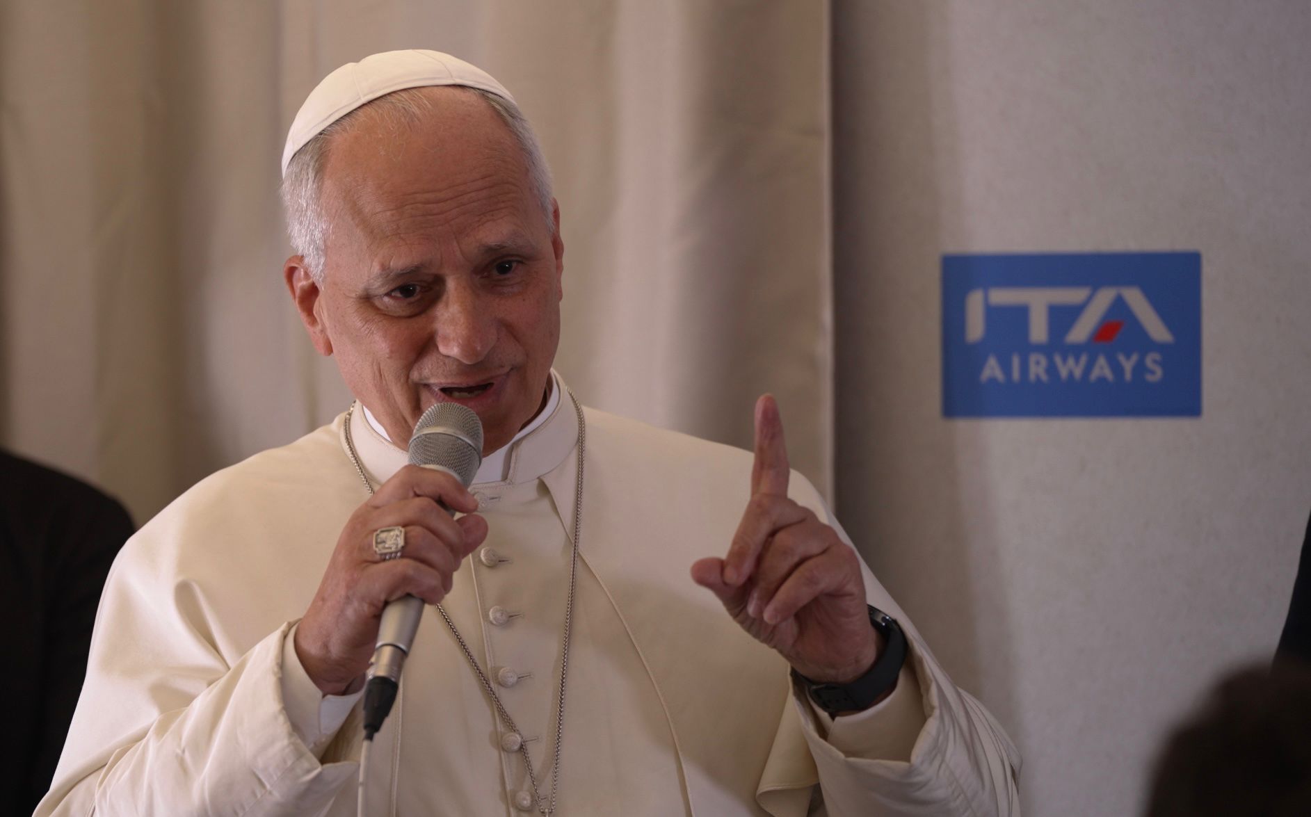 Pope Leo XIV speaks aboard the papal plane from Malabo, Equatorial Guinea, to Rome, following an 11-day trip in Africa, April 23, 2026. | Credit: Patrick Leonard/EWTN News