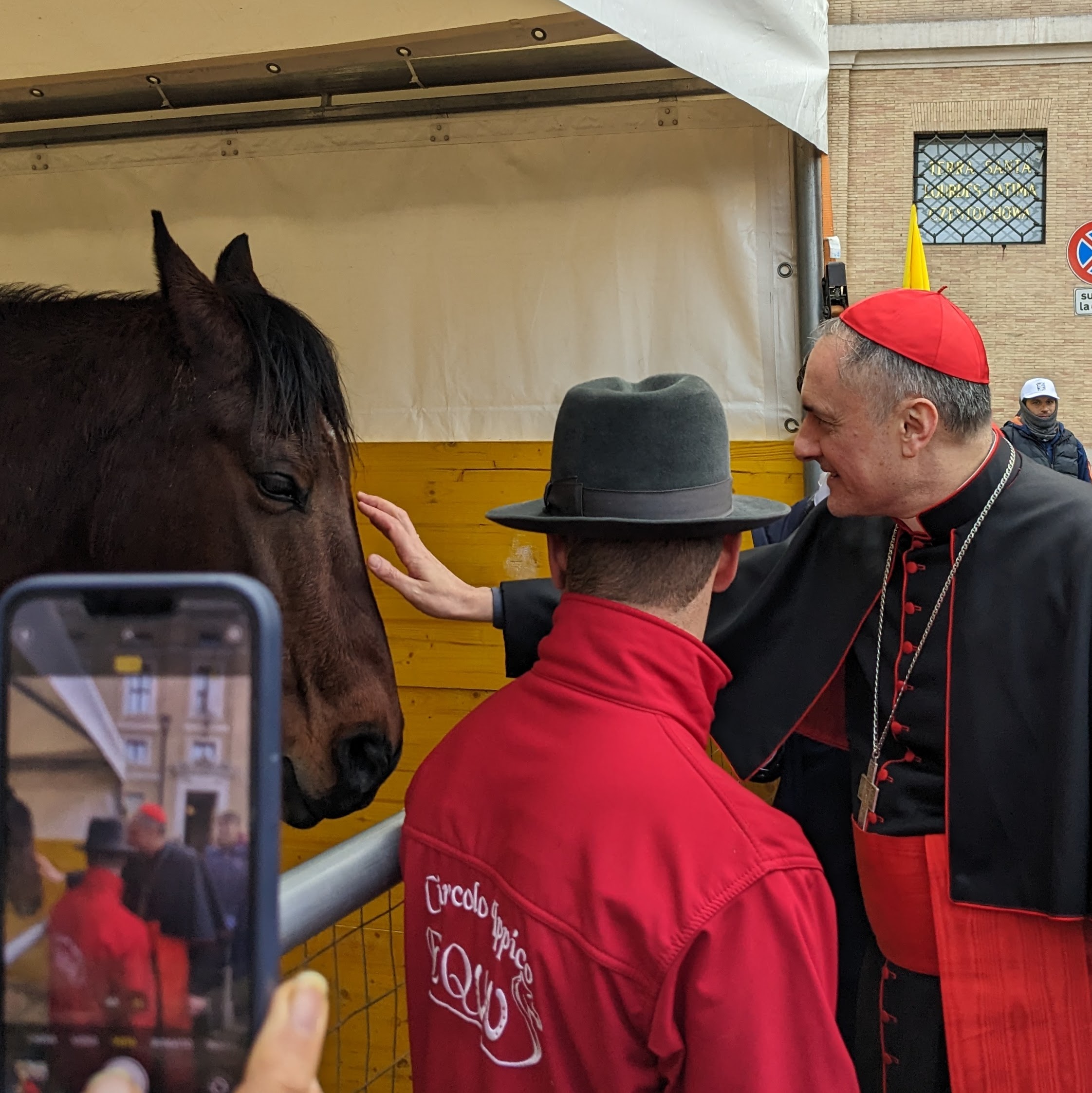 Cardinal Mauro Gambetti, the archpriest of St. Peter’s Basilica, individually greets many of the animals after offering a blessing on the feast of St. Anthony Abbot, Jan. 17, 2023. | Credit: Alan Koppschall/EWTN News