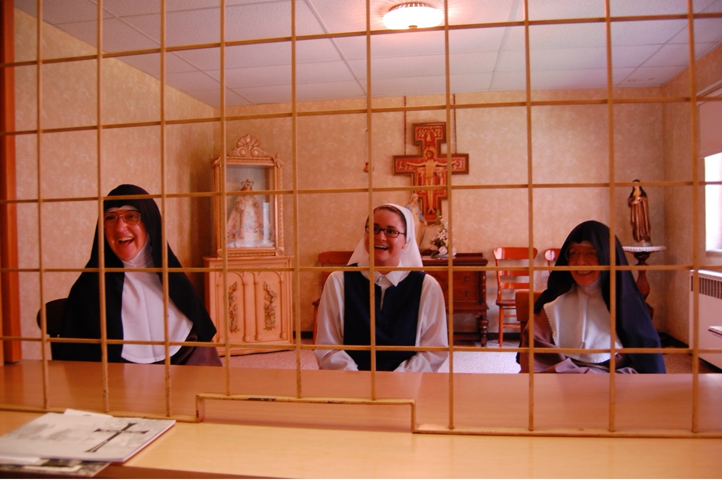 Sister Mary Agnes, a 2011 grant recipient and cloistered nun with the Poor Clares of the Diocese of Rockford, Illinois, visits with guests in the parlor after making her first profession of vows. | Credit: Fund for Vocations