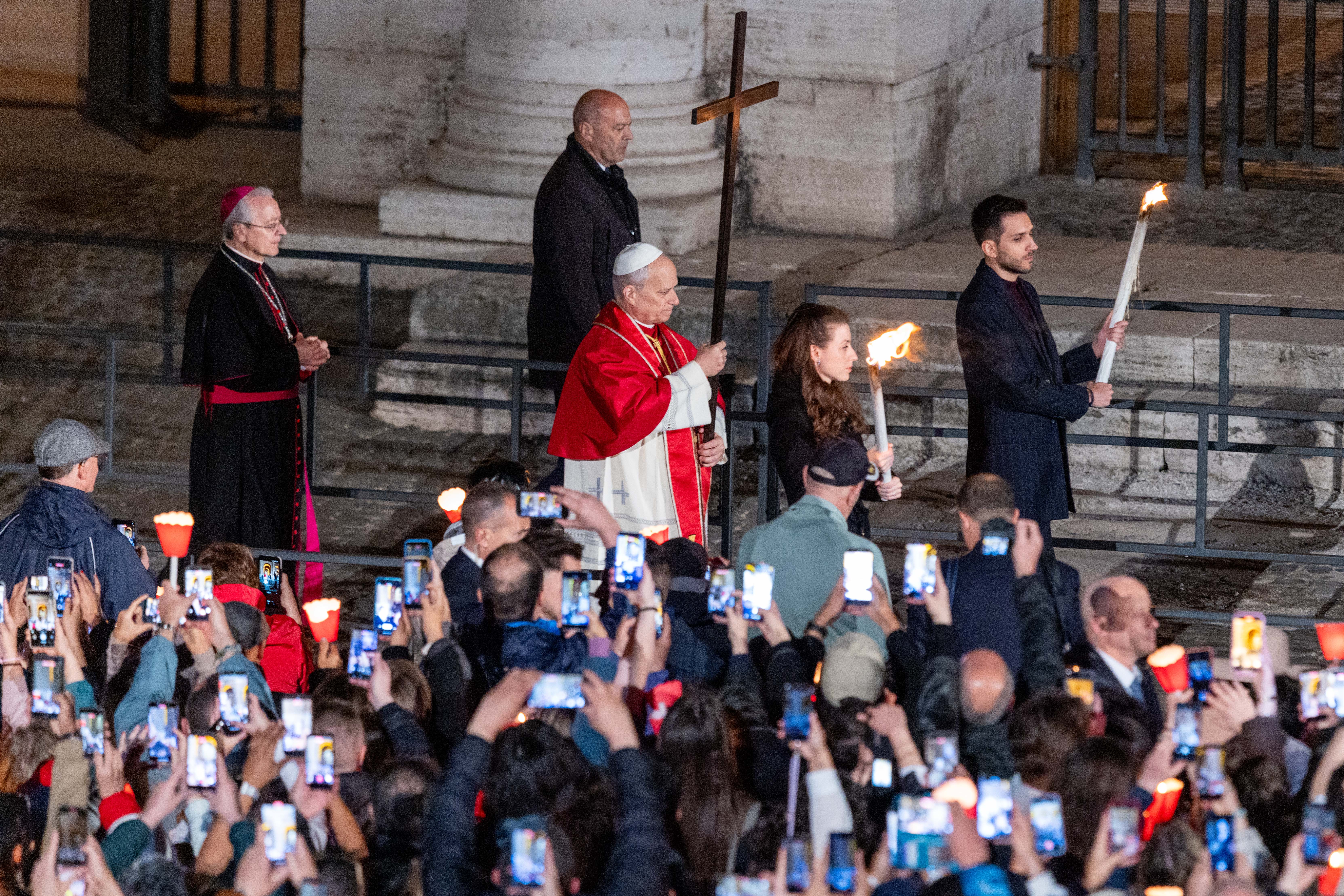 Pope Leo XIV carries the cross during the Via Crucis at the Colosseum in Rome, Friday, April 3, 2026. | Credit: Daniel Ibáñez/EWTN News