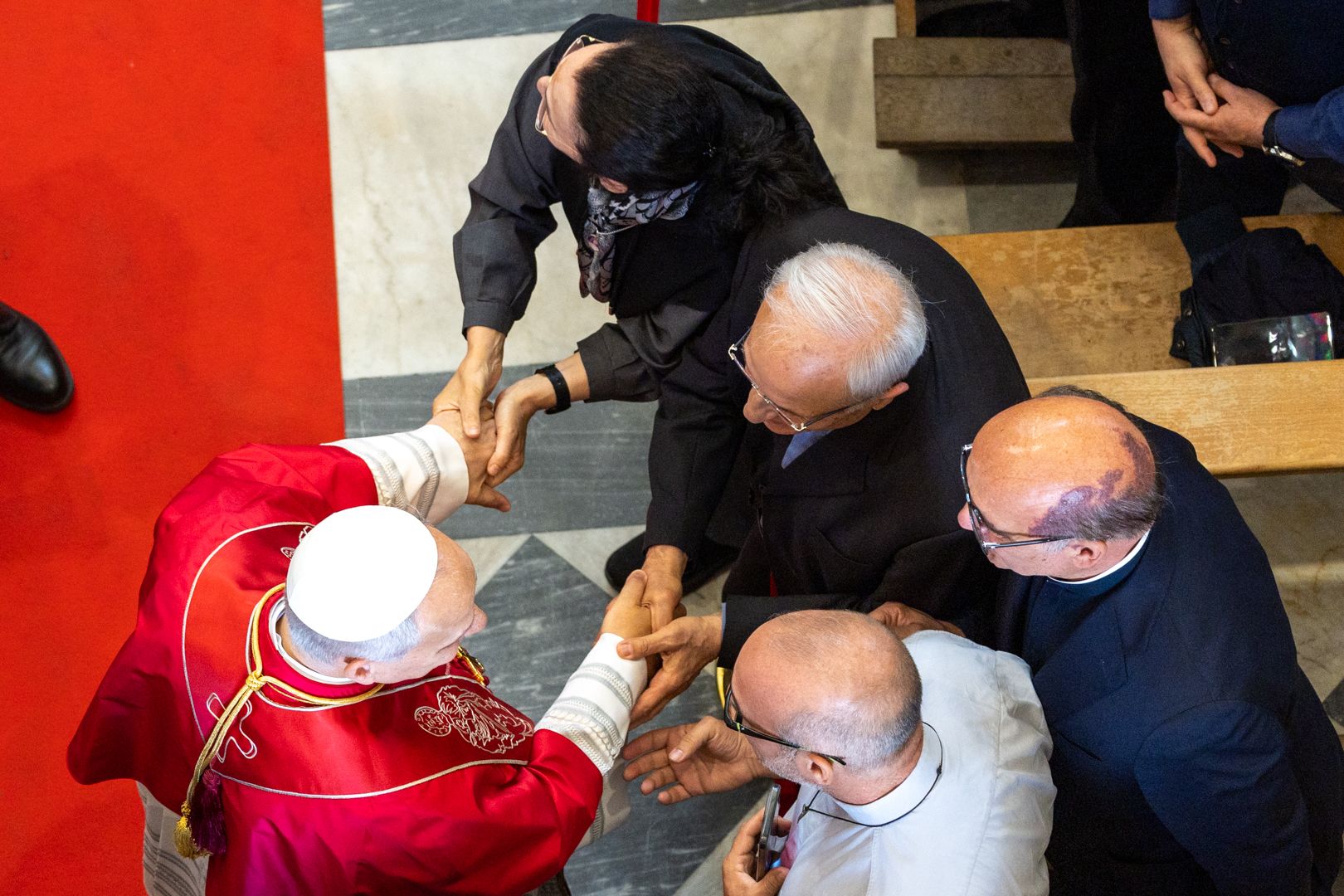 Pope Leo XIV greets the faithful at the Cathedral of Santa Maria Assunta in Acerra, Italy, May 23, 2026. The pope was visiting the so-called “Land of Fires” near Naples where illegal waste dumping has created a yearslong health crisis. | Credit: Daniel Ibáñez/EWTN News