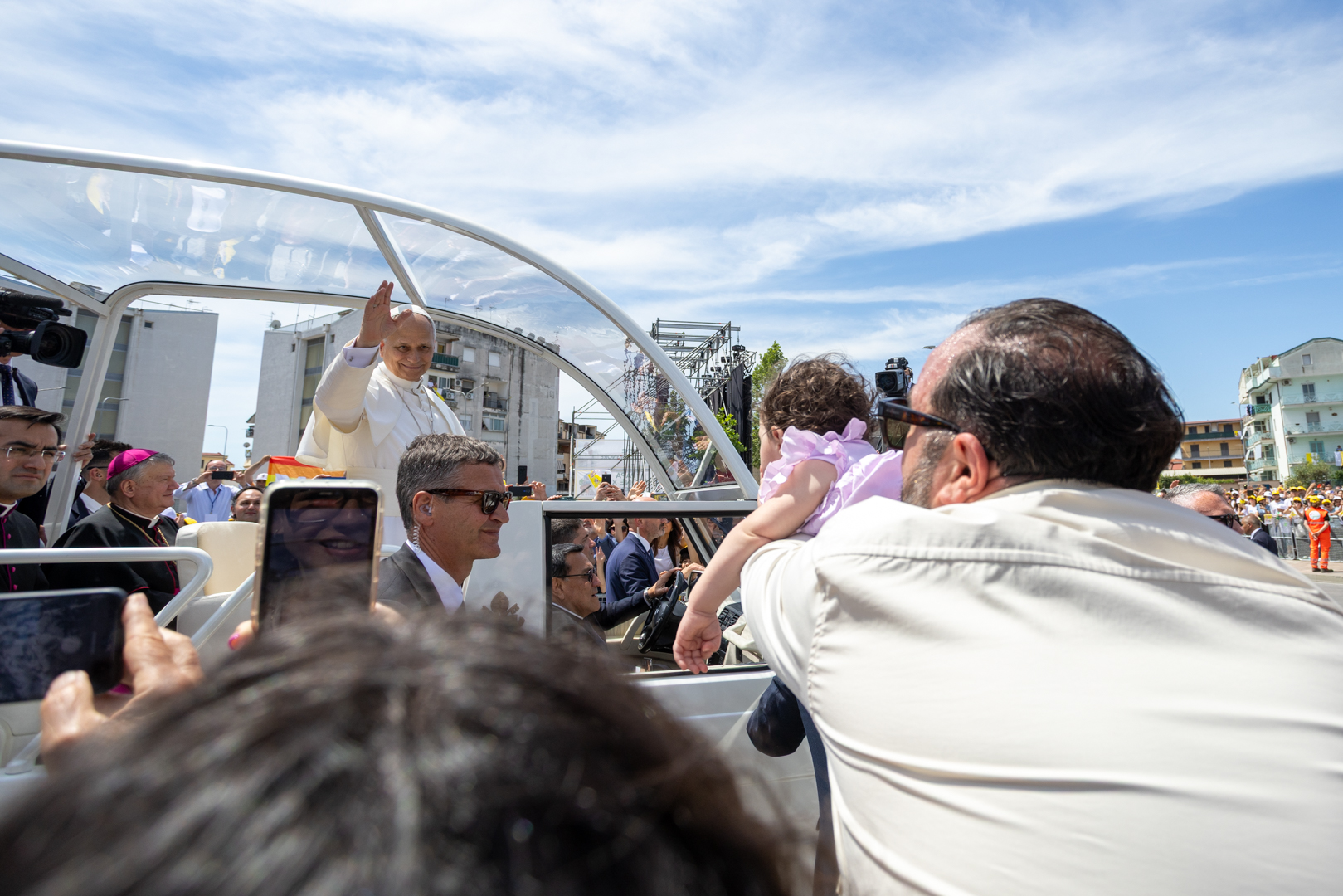 Pope Leo XIV greets crowds in Acerra, Italy, May 23, 2026. The pope was visiting the so-called “Land of Fires” near Naples where illegal waste dumping has created a yearslong health crisis. | Credit: Daniel Ibáñez/EWTN News