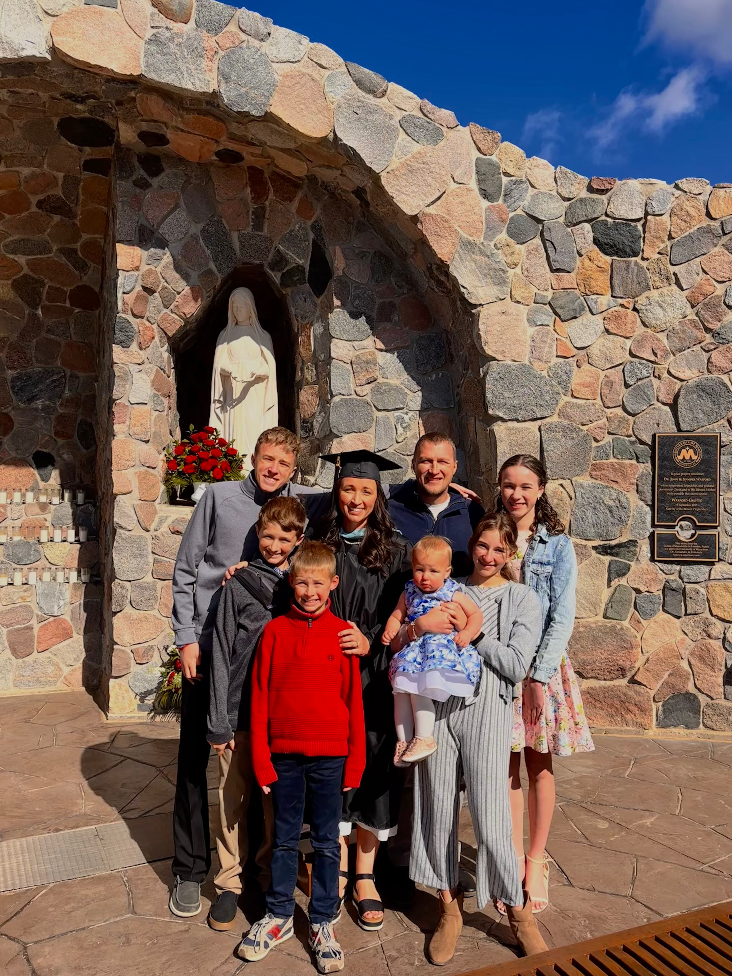 Kelly Helsel, her husband Doug Helsel, and their children at her graduation a the University of Mary on April 25, 2026. | Credit: Photo courtesy of Kelly Helsel