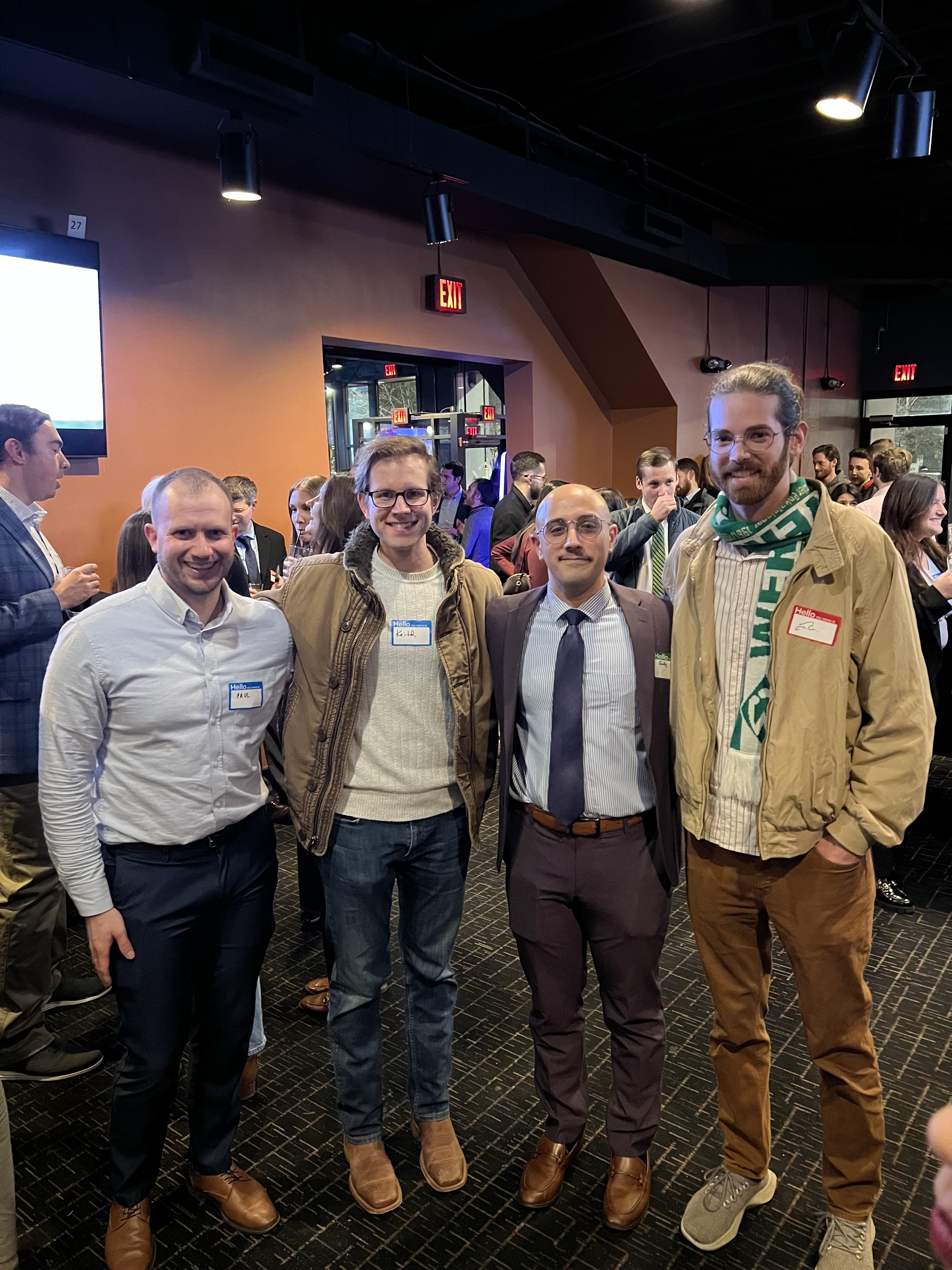 Fady Antoon (center right) with attendees at the Emmaus Happy Hour on Jan. 14, 2026. | Credit: Photo courtesy of Fady Antoon