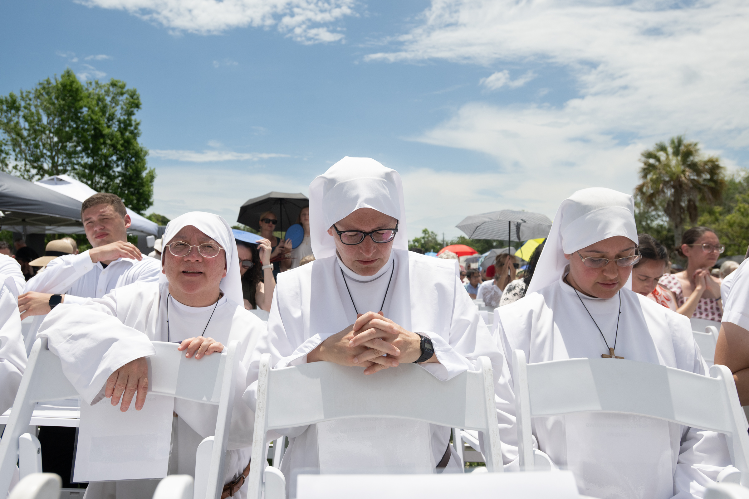 Religious sisters pray during Mass at the opening day of the National Eucharistic Pilgrimage on Pentecost Sunday, May 24, 2026, in St. Augustine, Florida. | Credit: Jeffrey Bruno