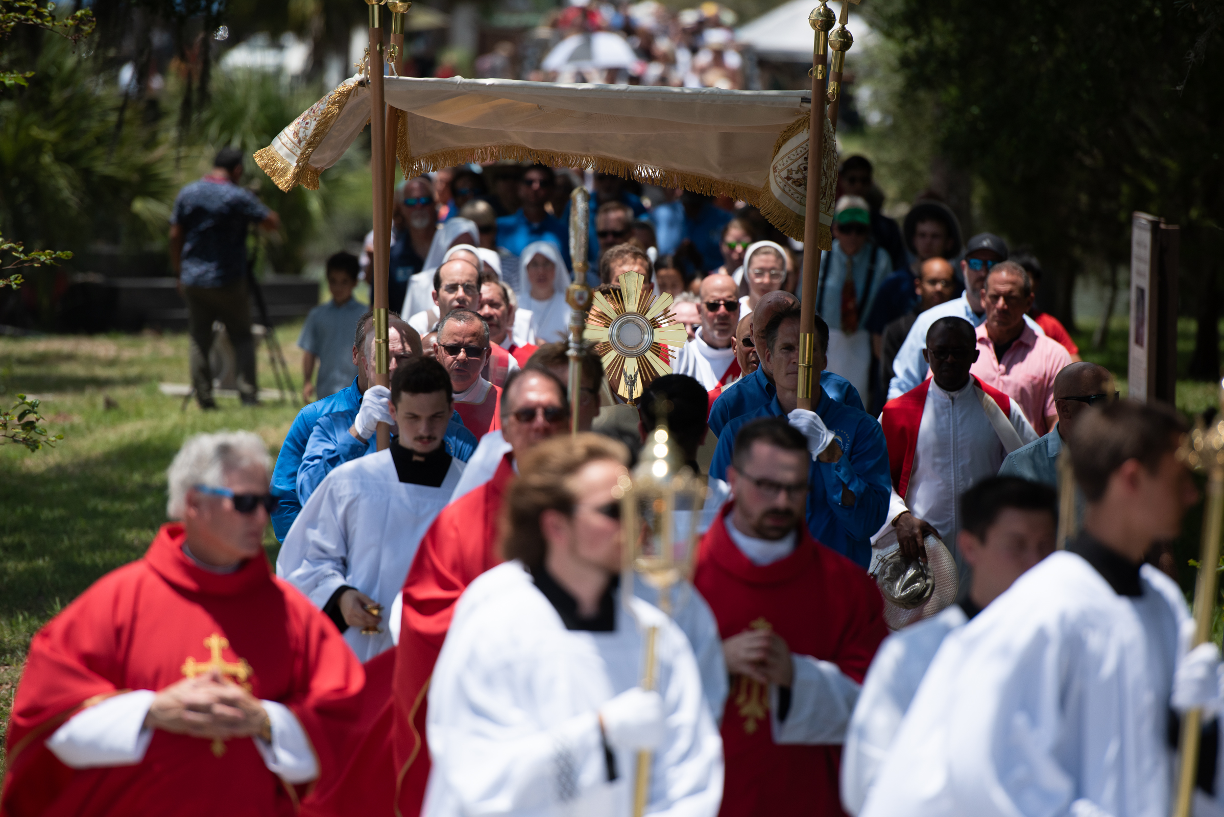 Jesus in the Blessed Sacrament is carried in procession from the grounds of the Shrine of Our Lady of La Leche to the historic chapel for adoration during the opening day of the National Eucharistic Pilgrimage on Pentecost Sunday, May 24, 2026, in St. Augustine, Florida. | Credit: Jeffrey Bruno