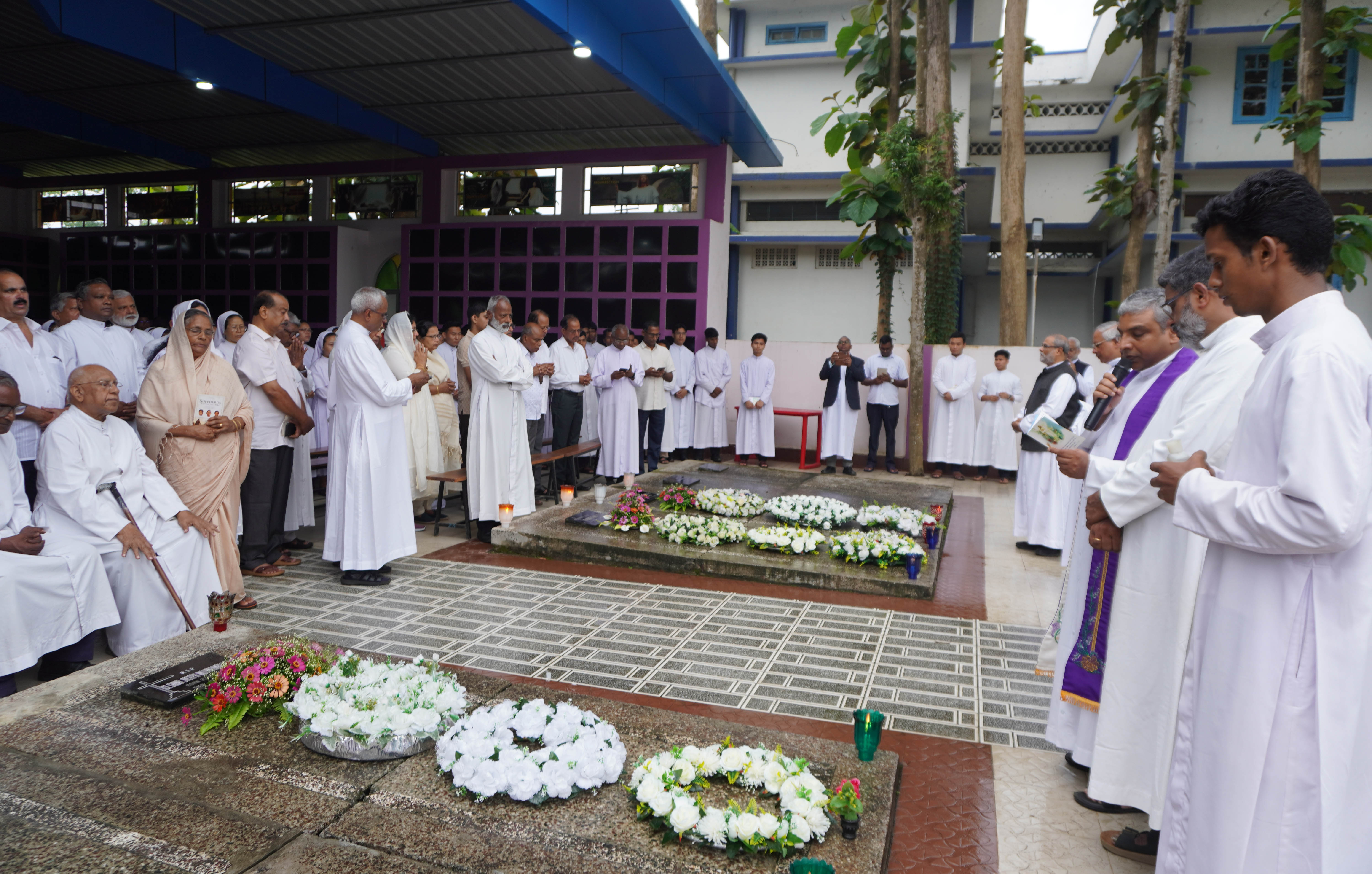 Relatives of three Salesians killed in Manipur in 2001 and members of the Salesian community gather at the provincial cemetery in Dimapur, India, for a 25th-anniversary memorial on May 15, 2026. | Credit: Anto Akkara