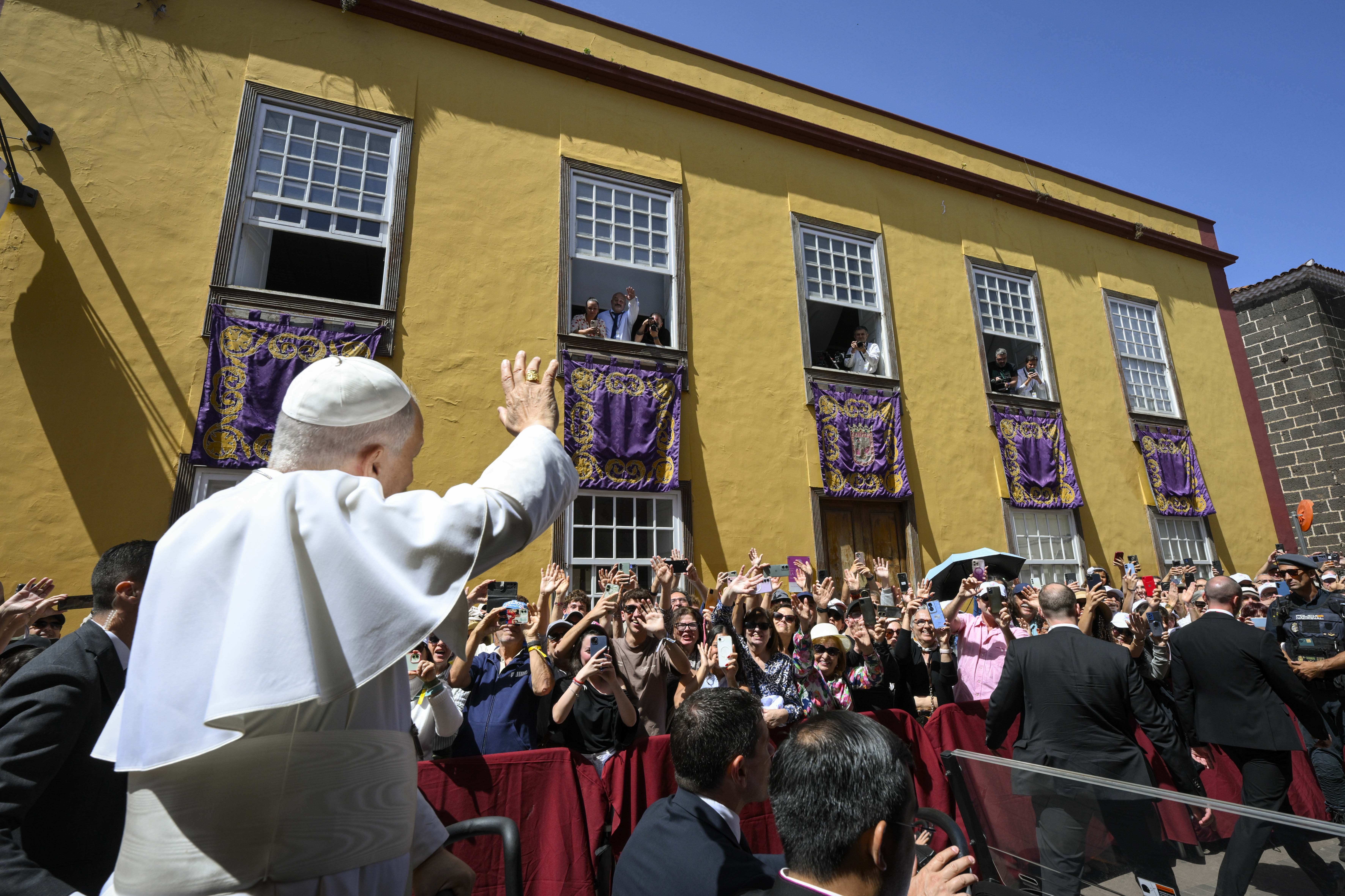 Pope Leo XIV waves at crowds during a meeting with organizations that assist with migrant integration, at the Plaza del Cristo de La Laguna, Tenerife, June 12, 2026. | Credit: Vatican Media