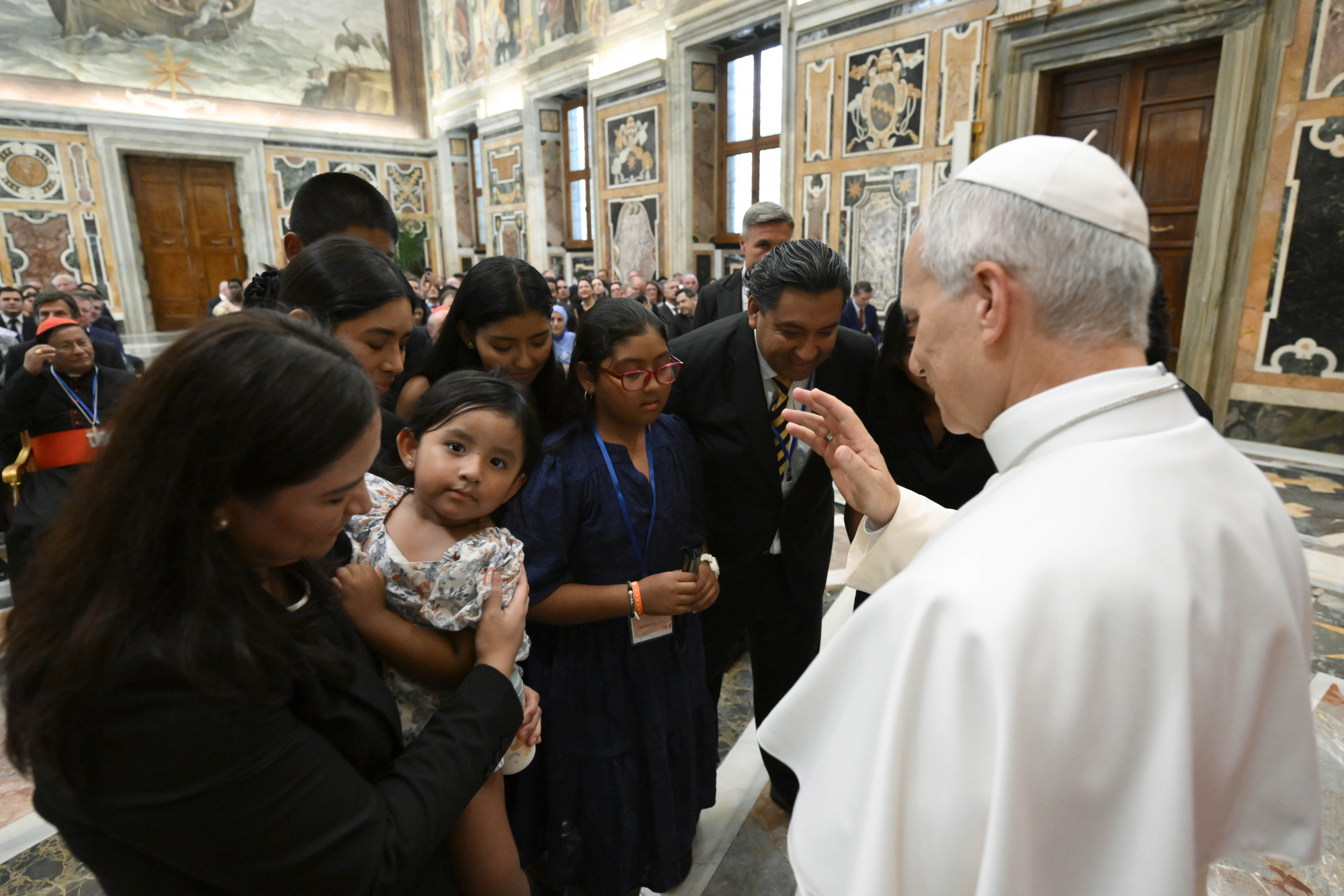 Pope Leo XIV blesses a family after a private audience with a delegation from the International Catholic Legislators Network at the Apostolic Palace in the Vatican on Aug. 21, 2026. | Credit: Vatican Media
