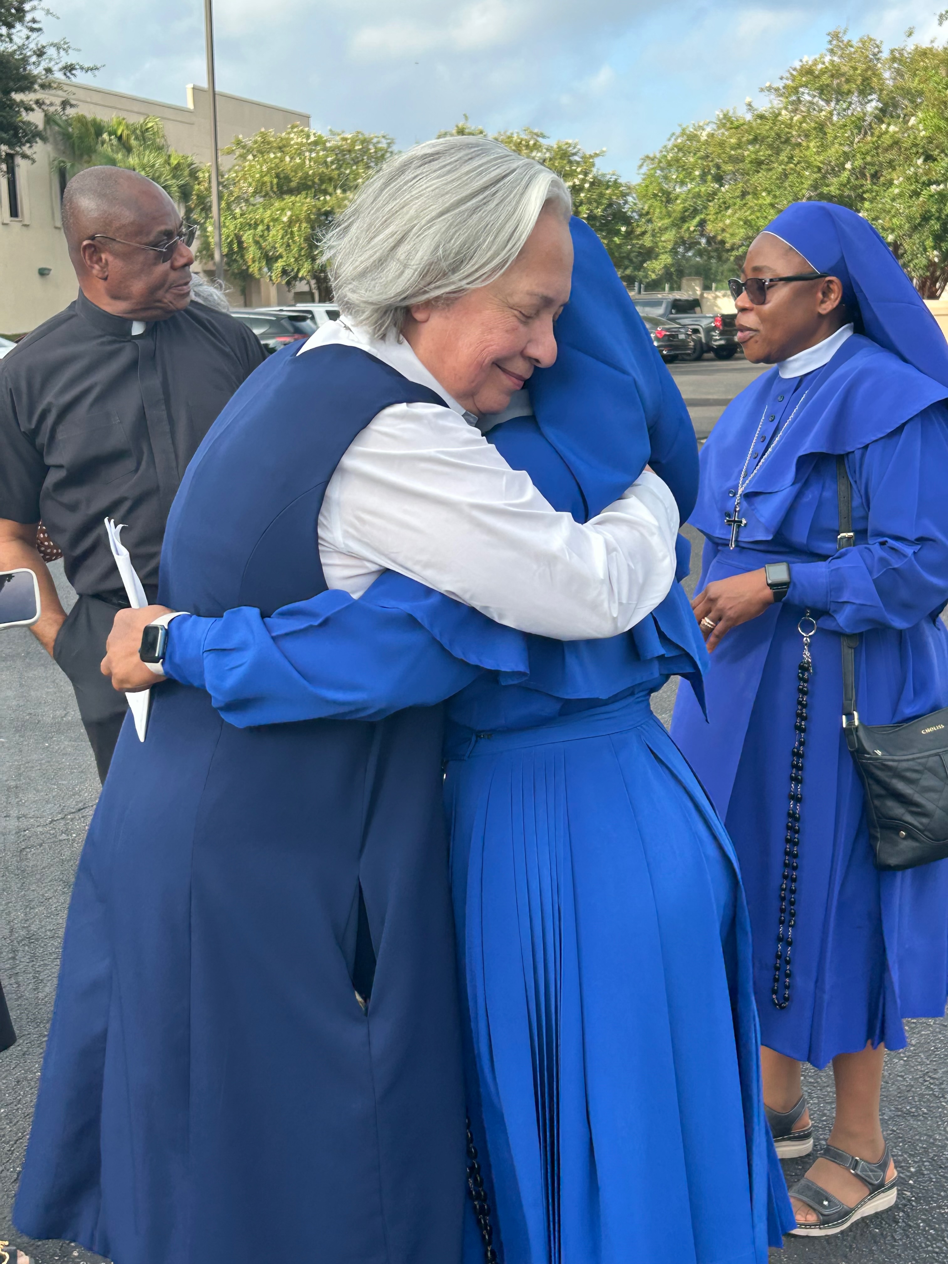 Sister Norma Pimentel hugs Sister Leticia Ugboaja outside the ICE field office in Harlingen, Texas, before Ugboajaʼs July 28, 2026 immigration check in. | Credit: Amira Abuzeid/EWTN News