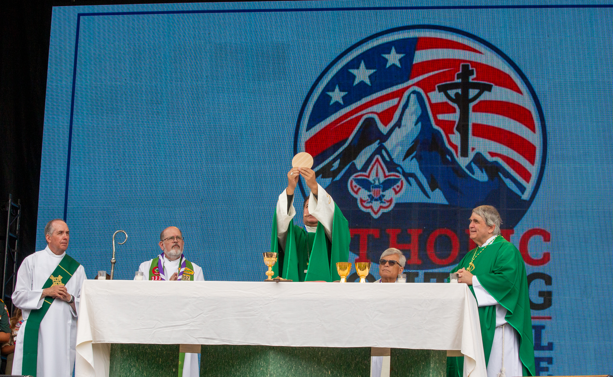 Bishop Evelio Menjivar-Ayala of Wheeling-Charleston, West Virginia, elevates the host during Mass at the Scouting America National Jamboree at the Summit Bechtel Reserve in West Virginia on July 26, 2026. | Credit: Photo courtesy of Scouting America