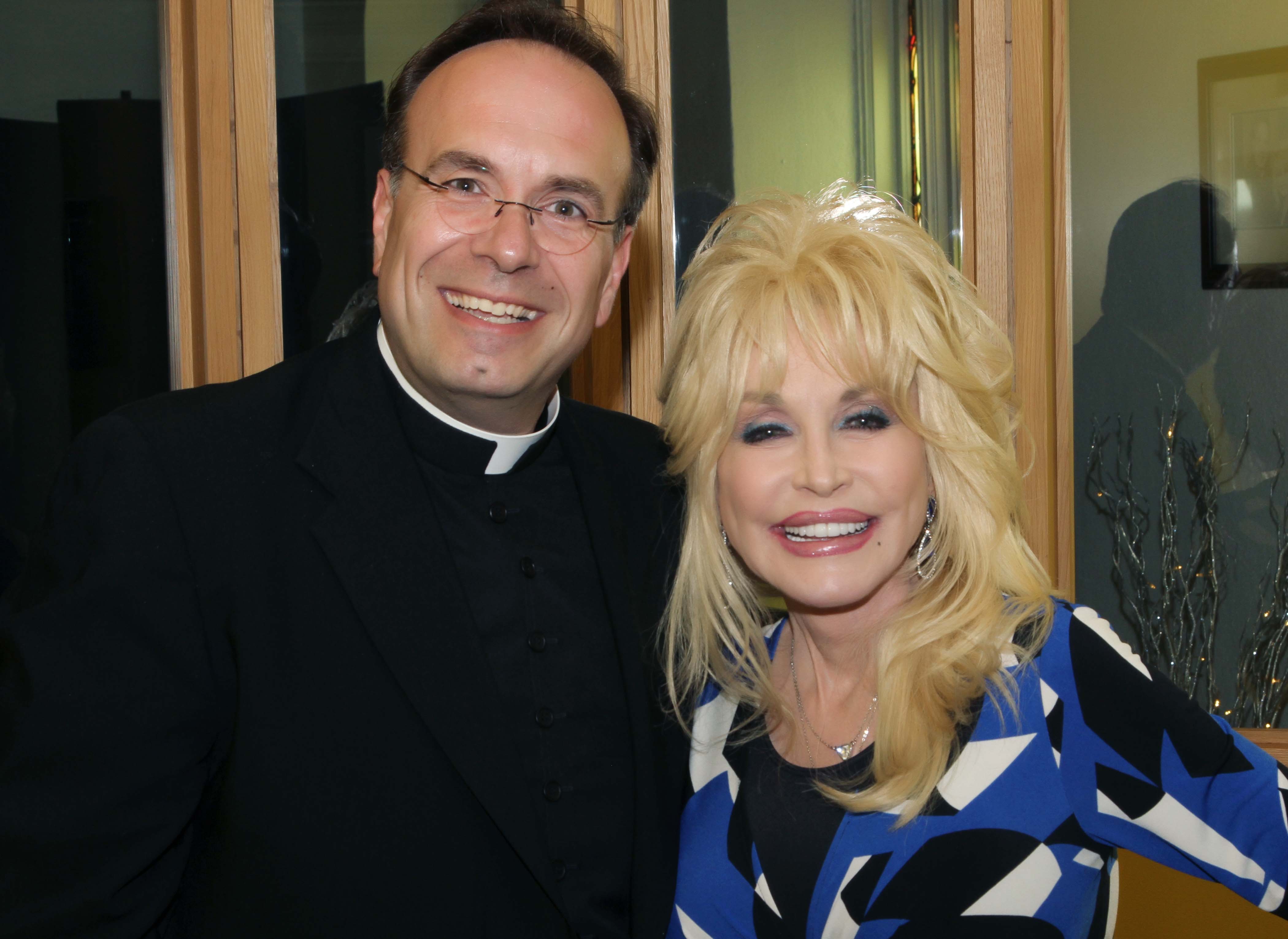 Father Jim Sichko and Dolly Parton on May 27, 2014. | Credit: Steve Bates/photo courtesy of Father Jim Sichko