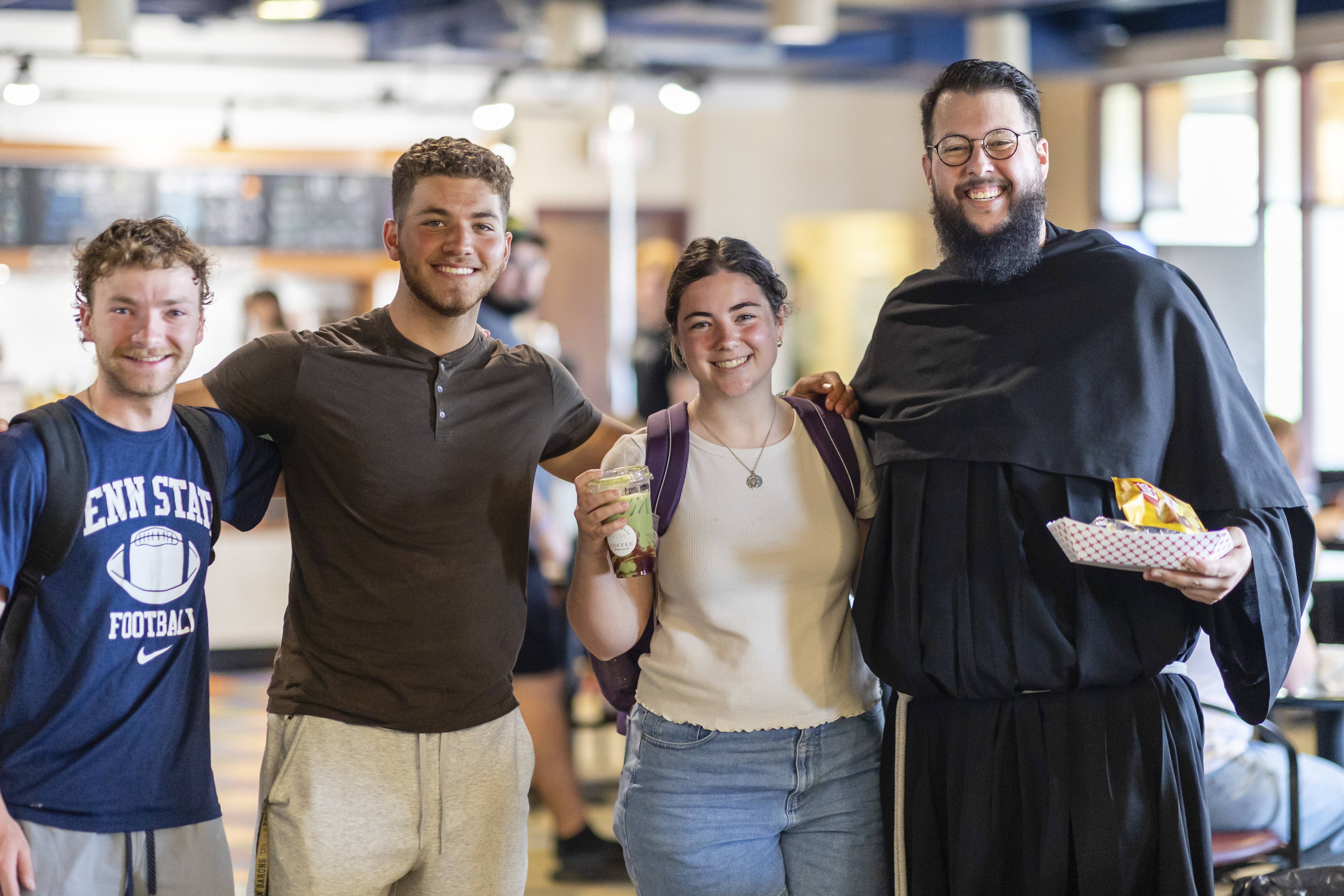 Father Rufino Corona, far right, with students at a Steubenville Youth Conference. | Credit: Franciscan University