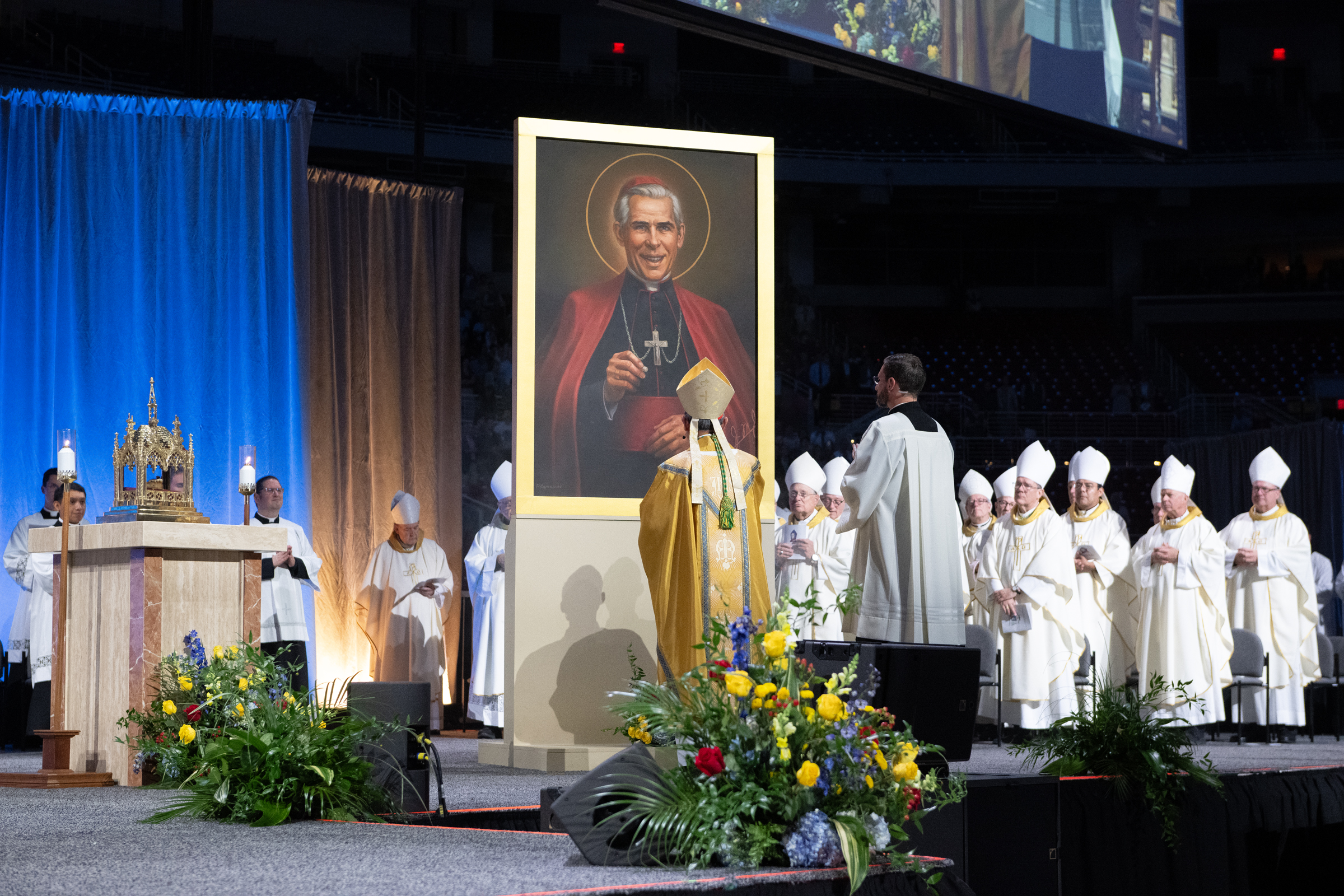 Cardinal Tagle stands before the new image of Blessed Fulton Sheen during the beatification Mass in St. Louis on Sept. 24, 2026. | Credit: Jeffrey Bruno