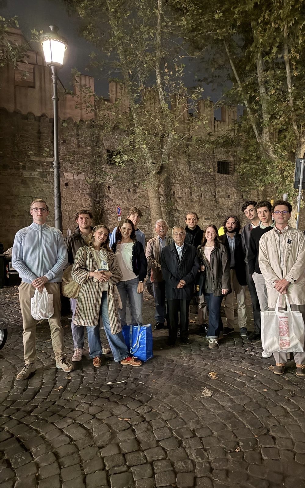 Youth volunteers, including Luigi Salvaggi (sixth from right), prepare to feed the homeless in St. Peterʼs Square on Oct. 6, 2026. | Credit: Isabella Reed/EWTN News