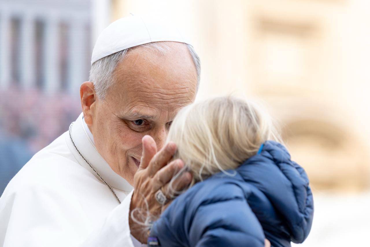 Pope Leo XIV blesses a child during his weekly general audience in St. Peter’s Square on Oct. 28, 2026. | Credit: Daniel Ibáñez/EWTN News