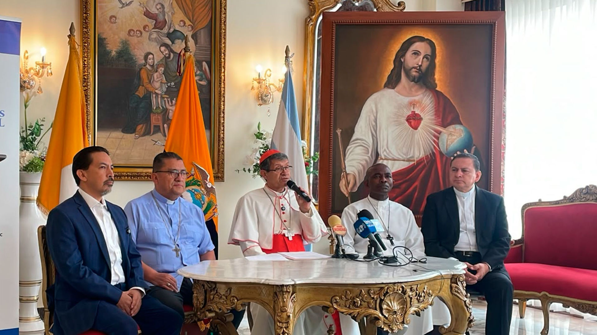 Cardinal Luis Cabrera at an Oct. 28, 2026, press conference stands before an image of the Sacred Heart of Jesus, which he blessed and which will be present at the Mass on Oct. 31. | Credit: Archdiocese of Guayaquil