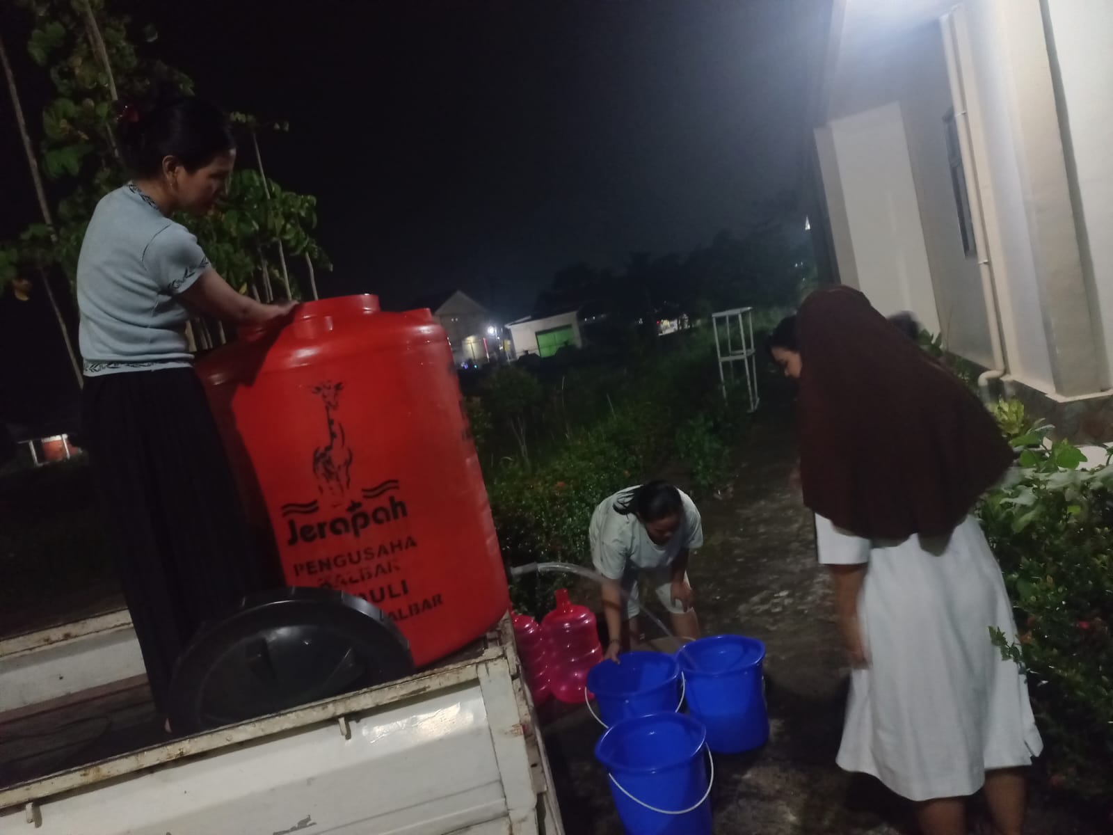Catholic sisters prepare containers of clean water for families affected by the fires. | Credit: Photo courtesy of Friar Taucen Girsang, OFM