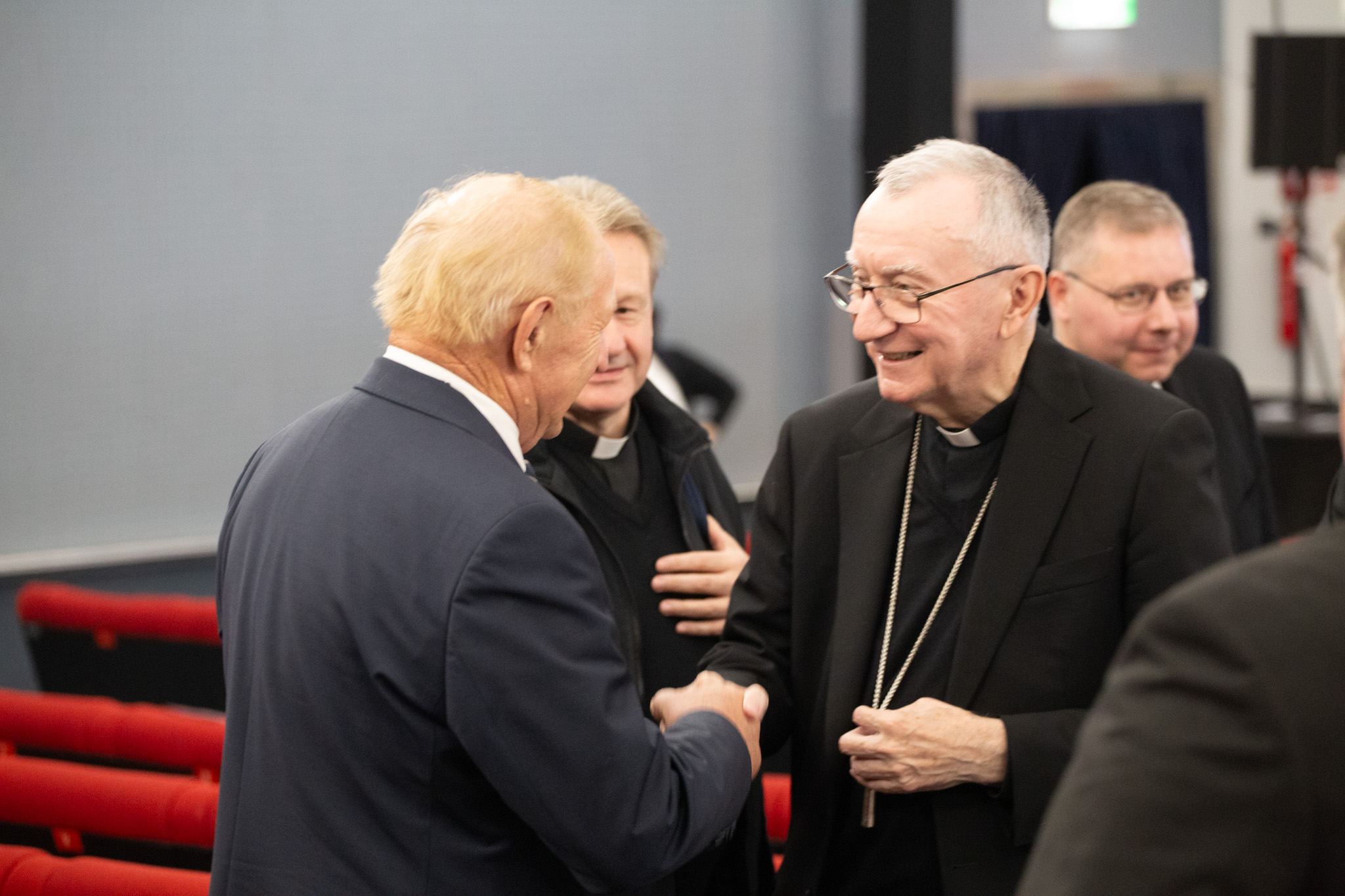 Vatican Secretary of State Cardinal Pietro Parolin greets participants after he spoke at the congress “The Splendor of the Human Person: Preserving Fertility, Healing Infertility” at the Rome campus of the Catholic University of the Sacred Heart on Oct. 16, 2026. | Credit: Isabella Reed/EWTN News